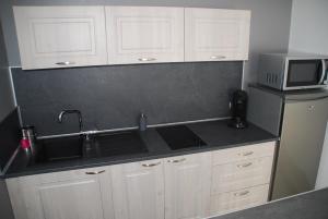 Appartements Comme a la maison : photos des chambres