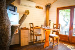 Maisons de vacances Cabane Dans les Arbres, Domaine de l Ogliastru : photos des chambres