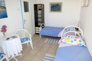 Two-Bedroom Apartment with Balcony and Sea View room in Apartments by the sea Omis - 2823