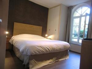 Appartements Les Carmes : photos des chambres