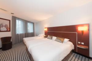 Hotels Kyriad Limoges Centre Gare - Atrium : photos des chambres