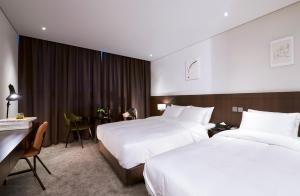 Deluxe gia đình 2 giường (Deluxe Family Twin)