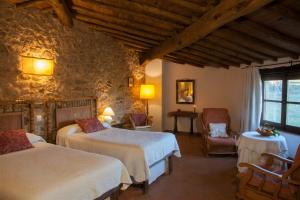 Twin Room with 1 or 2 Extra Beds room in Casa Rural El Cabezo