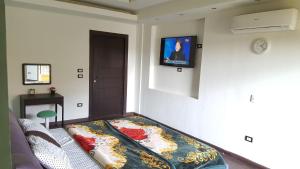 Three-Bedroom Apartment room in The Resort Apartment for families ONLY - New Cairo