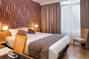 Hotels Logis Hotel du Midi - Saint Etienne Sud : photos des chambres