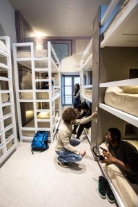 Bed in 12-Bed Mixed Dormitory Room room in Little Italy Boutique Hostel