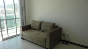 Prainha Aconchegante apto de quarto e sala com vista para o mar