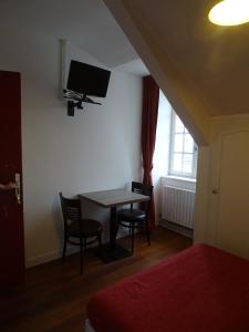 Double Room with Shared Toilet room in Hotel Restaurant Du Commerce