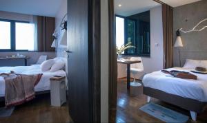 Hotels L'Ermitage Hotel Cuisine-A-Manger : photos des chambres