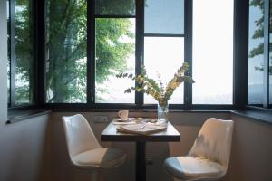 Hotels L'Ermitage Hotel Cuisine-A-Manger : photos des chambres