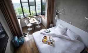 Hotels L'Ermitage Hotel Cuisine-A-Manger : photos des chambres