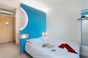 Hotels First Inn Hotel Paris Sud Les Ulis : photos des chambres