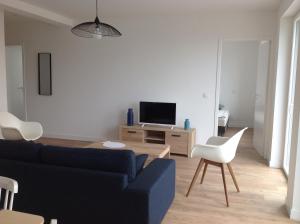 Appartements the place to be : photos des chambres