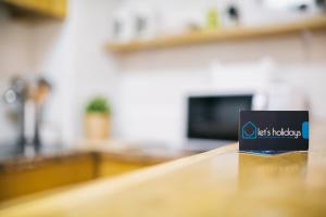 Lets Holidays White apartment with terrace, ac & parking, near beach