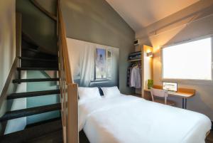 Hotels B&B HOTEL Nantes Atlantis Le Zenith : photos des chambres
