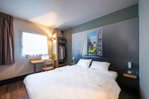 Hotels B&B HOTEL Nantes Atlantis Le Zenith : photos des chambres