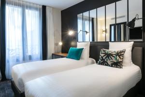 Hotels Laz' Hotel Spa Urbain Paris : photos des chambres