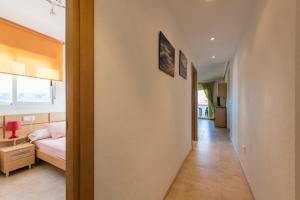 Three-Bedroom Apartment room in Apartamentos Jardines del Mar II