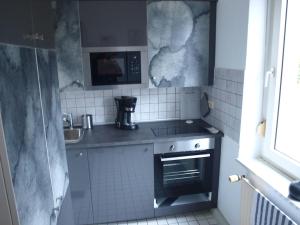Appartment Grau im Grünen