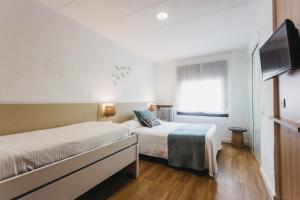 Quadruple Room (2 Adults + 2 Children) room in Hotel Catalunya Ribes de Freser