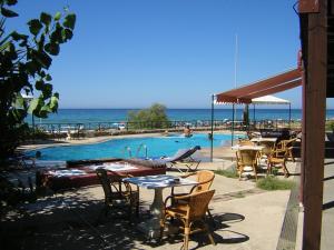 Menigos 57 seafront with garden Corfu Greece