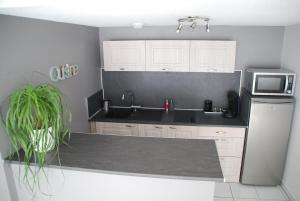 Appartements Comme a la maison : photos des chambres