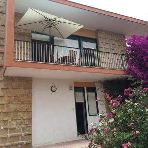 Appartamentino con veranda in Villa fronte mare