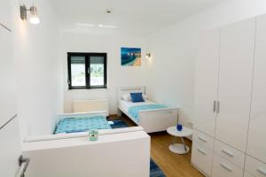 Two-Bedroom Apartment with Balcony room in Apartments by the sea Dubrovnik - 14636