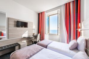 Hotels Hotel Le Saint Paul : photos des chambres