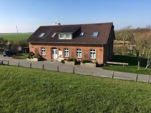 Ferienhaus Hemenswarft direkt an der Nordsee mit Meerblick