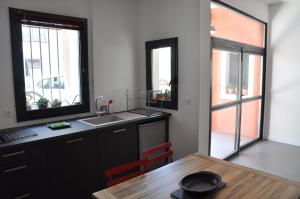 Appartements Rouge Pompon : photos des chambres