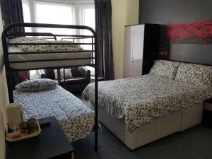 Family Room (2 Adults + 2 Children) room in Langroyd Hotel