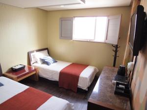 Phòng 2 giường có phòng tắm riêng (Twin Room with Private Bathroom)