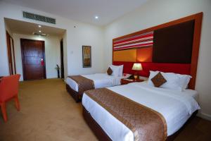 Standard Twin Room with Pool View room in Tolip Family Park Hotel