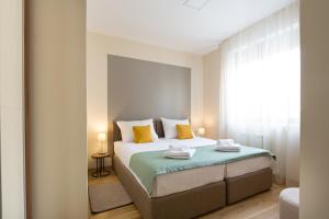 One-Bedroom Apartment - Twin Bed room in Prime Hotel Garni