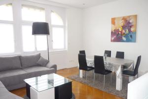 Appartements Avenue de La Paix - L'Exclusif : photos des chambres