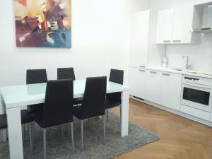 Appartements Avenue de La Paix - L'Exclusif : photos des chambres