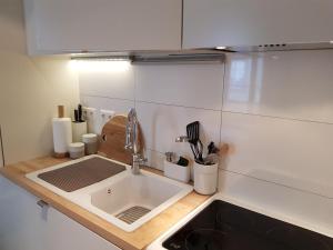 Appartements Studio design Nuee bleue tout equipe centre ville : photos des chambres