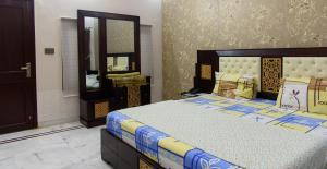 Deluxe Double Room room in Patel Residency Guest House 2
