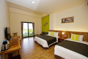 Phòng 3 Người Nhìn Ra Vườn (Triple Room with Garden View)