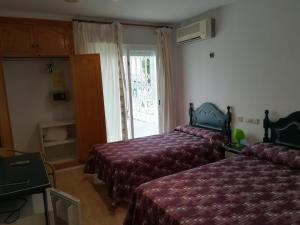 Triple Room room in Hostal Sol Bahía San José