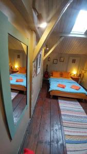 Double Room with Shared Bathroom room in Rooster Hostel