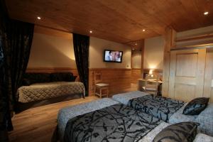 Hotels Logis Hotel & Spa Beau-Site : photos des chambres