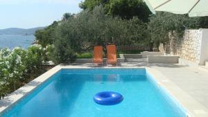 Apartments Niana with heated seawater swimingpool