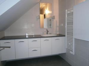 Appartements Le Jardin Fleuri : photos des chambres