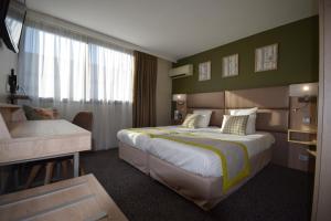 Hotels Kyriad Prestige Bordeaux Aeroport : photos des chambres