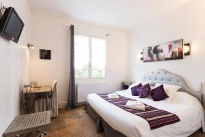 Hotels Logis Hotel Emeraude des Bois : photos des chambres