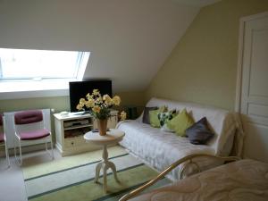 Appartements Le Jardin Fleuri : photos des chambres