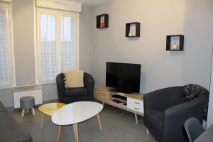 Appartements Le Ch'ti Champenois : photos des chambres