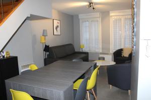 Appartements Le Ch'ti Champenois : photos des chambres